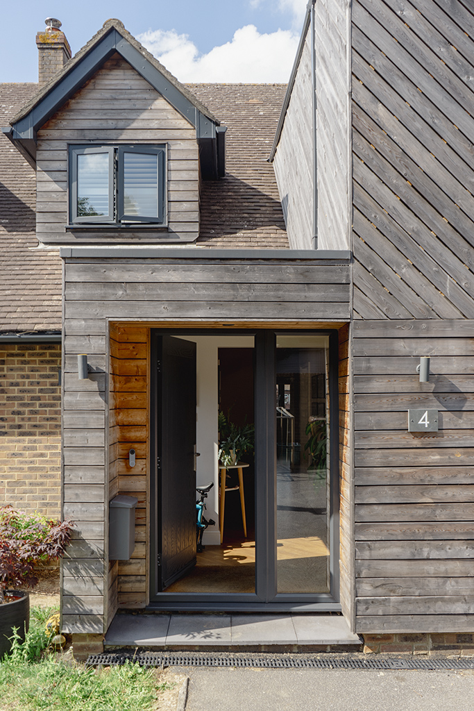 A photograph of the timber-clad entrance to the Pembury Extension project